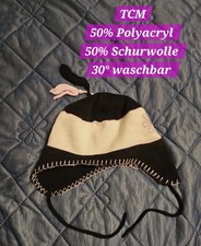 Ohrenklappem- Wollmütze für