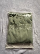 neuer grüner Stillpullover