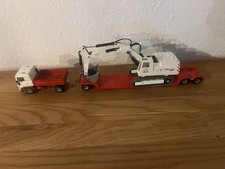 Siku 1:55 LKW Volvo F12 mit Anhänger und Menck Bagger