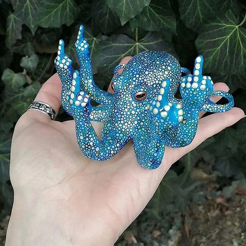 Mittelfinger oktopus statue - oktopus,