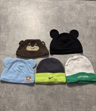 5 Mützen von H&M, Nike