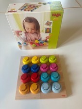 HABA Steckspiel: Farbkringel Material: 32 Teile und Steckplatte aus Buche.