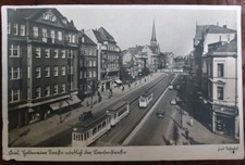 Foto Ak Kiel - Holtenauer Straße mit Strassenbahnen und Läden  Feldpost -selten!
