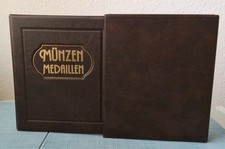 Münzalbum mit Schutzkassette