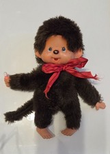 Monchhichi-Puppe mit Schleife