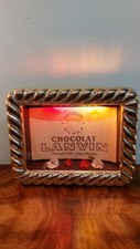 Beleuchtetes Werbeschild.     ,,Chocolat Lanvin''