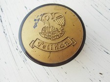 Antike runde Dose aus Bakelit von "Pelikan" Farbe: Schwarz und Gold