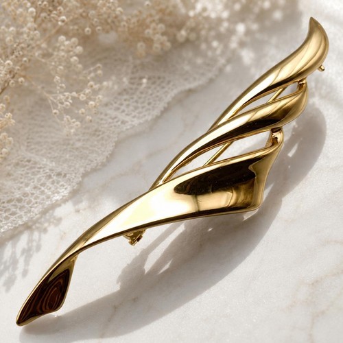 Pierre cardin gold brosche - pierre,