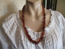 Bernsteinkette geschliffen verlaufend