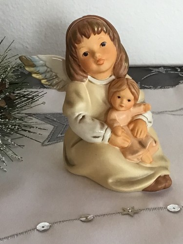 Goebel engel hält puppe - engel,
