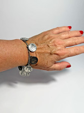 Bettelarmband mit 9 antiken