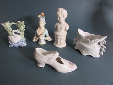 5 Nippesfiguren -  Nippes  -  Porzellan -  darunter Teepuppe - Half Doll