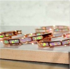 Große Rosegold Opal Creolen