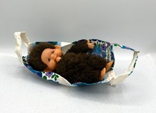 Altes Monchhichi schlafend