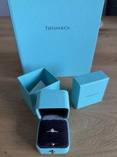 Tiffany setting - &,