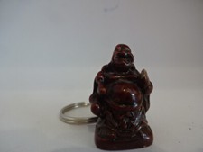 Glücksbringer " Schlüsselanhänger " Rotbrauner Budda mit Papyrosrolle