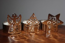 3 kleine Teelichthalter mit