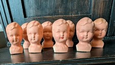 8 alte kleine Puppenköpfe