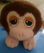 Affe aus Plüsch, ca. 22 cm hoch, Farbe braun in Kugelförmigen 