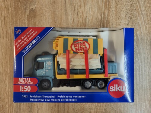 Lkw mit fertighaus siku - mit, 1:55