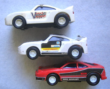 Slotcar Porsche ? Ferrari ? weiß und rot Scale 1:43 ? L 9,5cm mit Licht Konvolut