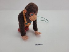 Mechanisches Spielzeug Affe