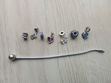 Pandora Armband mit 6 Charms +