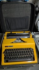 DDR Reiseschreibmaschine Daro Erika 100/105 Koffer und Beschreibung