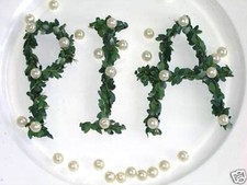 Buchstabe mit Perlen