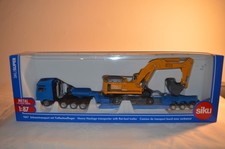 Siku 1847 - MAN Schwertransporter mit Tiefbettauflieger, neu in OVP, 1:87