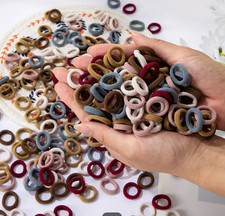 50-100x Haargummi Schwarz