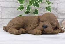 Steinfigur Hund schlafend