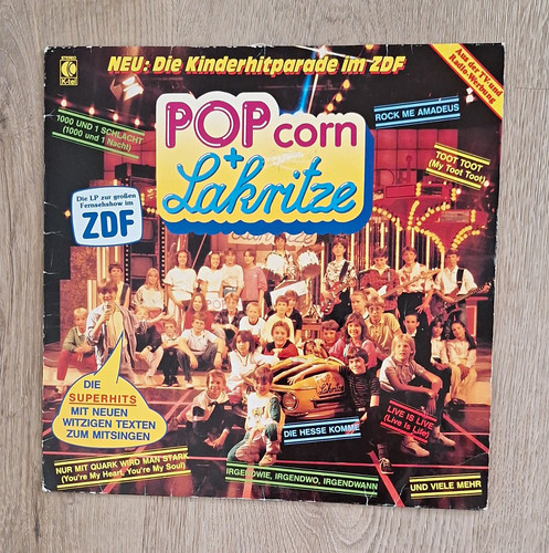 Tel popcorn lakritze - +, –