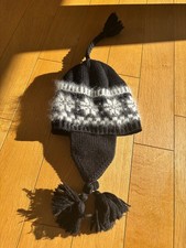 Wollmütze mit Bommeln Schwarz