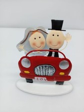 Hochzeitspaar im Auto, ca. 20