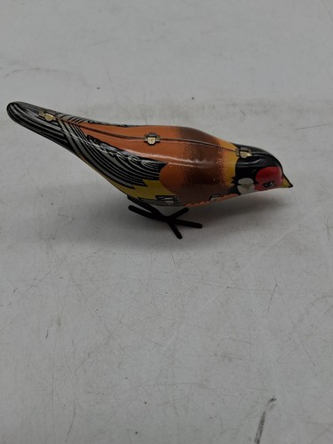 Mechanischer blech pickvogel - mechanischer, blech-pickvogel