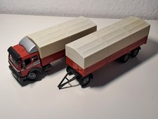 Modell NZG 1:43 Nr.314 Mercedes Benz Hängerzug Pritsche Plane rot