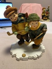 Seneca Design Weihnachten Figuren Kinder Eishockey spielend