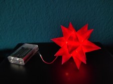 Roter Bascetta/Origami-Stern mit LED-Beleuchtung