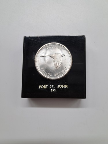 One canadian silver dollar - silver, in