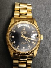 bulova super sevilla day date