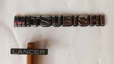  Mitsubishi Emblem MB 117150-2, 1 Stück und 1 Stück Lancer MA 145346 Schriftzug