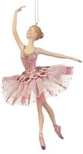 Eine Ballerina Figur in Pink