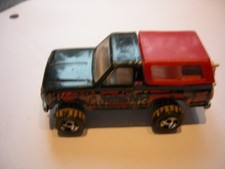 Hot Wheels 1980 Ford Bronco "Mudster" Pick-up Truck mit Motorrad 4X4 "WASH ME"