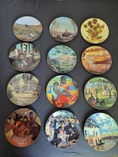12 Limoges Decorative Plates