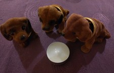 Drei kleine Wackeldackel