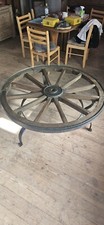 Wagenradtisch mit Glasplatte,  handgeschmiedet