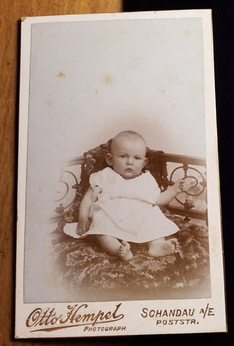 Sitting small child - small,