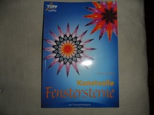 Kunstvolle Fenstersterne aus