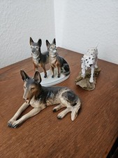 2 Porzellan Hunde Statuen und